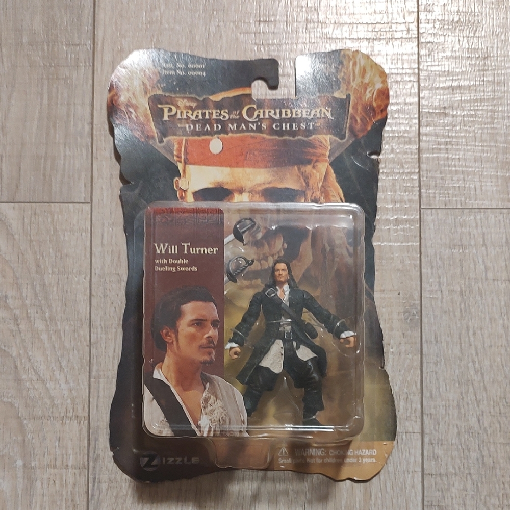 Pirates of the Caribbean Will Turner Action Figure with Swords